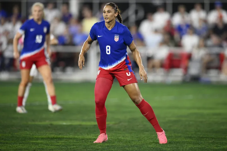 Lynn Williams, NWSL's all-time leading scorer, poses in her new Seattle Reign FC jersey after being traded from Gotham FC in December 2024.