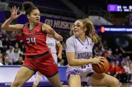 Elle Ladine celebrates after scoring a career-high 40 points during the Washington Huskies' win against Northwestern.