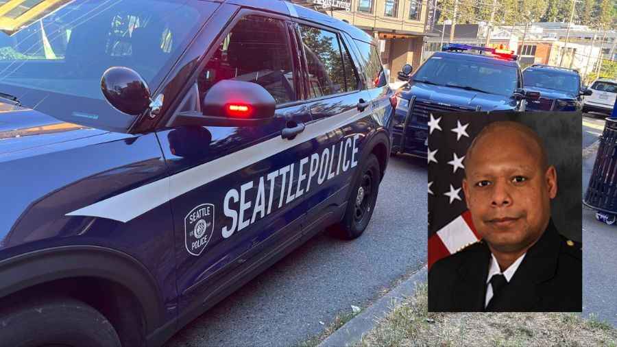 Shon Barnes, nominated as Seattle Police Chief, with a headshot overlaying an image of a Seattle police vehicle.